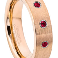 rose pipe cut tungsten wedding band with three ruby gemstones in bezel setting.